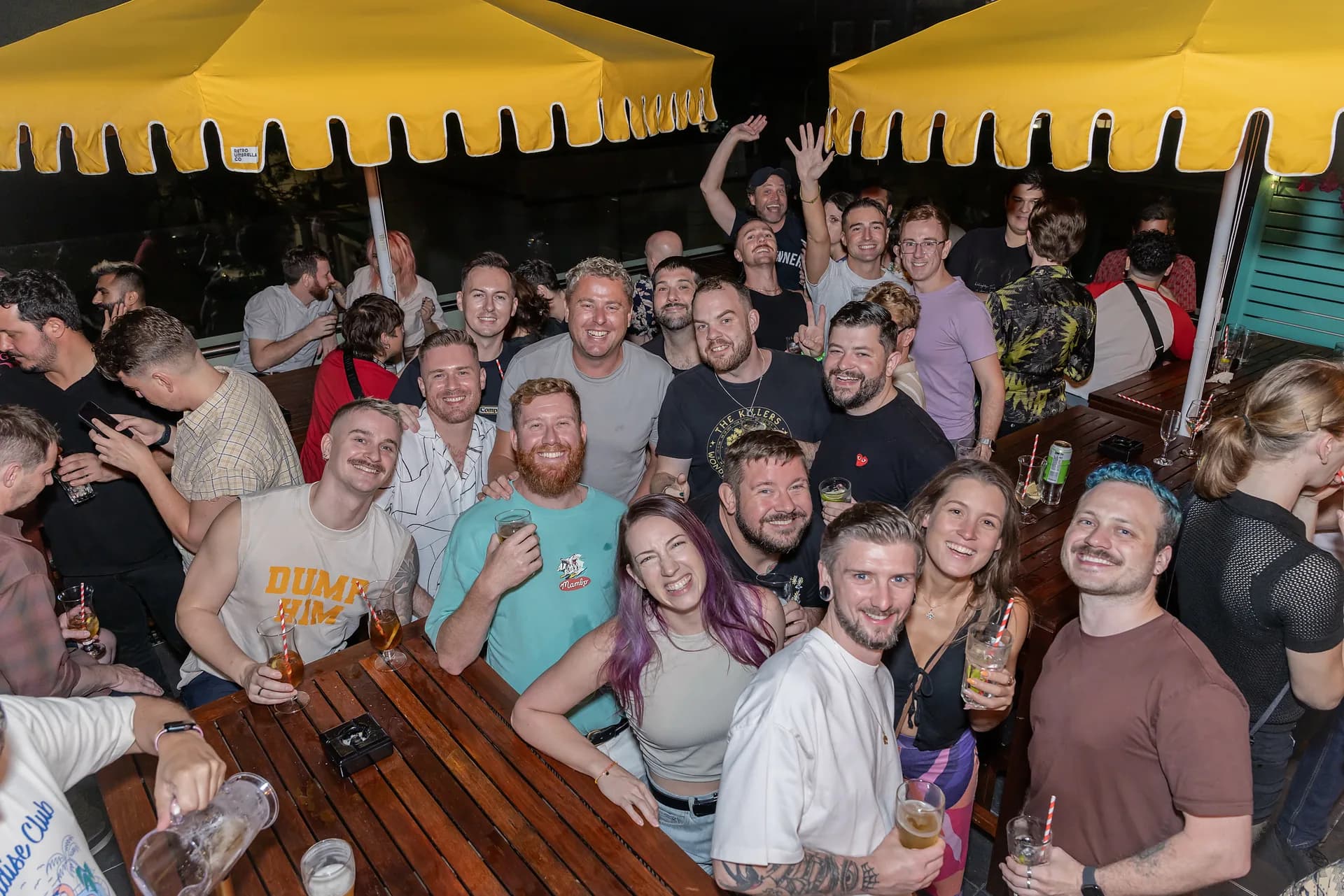 A large group of guests celebrating together on The Deck at Stonewall Newtown.